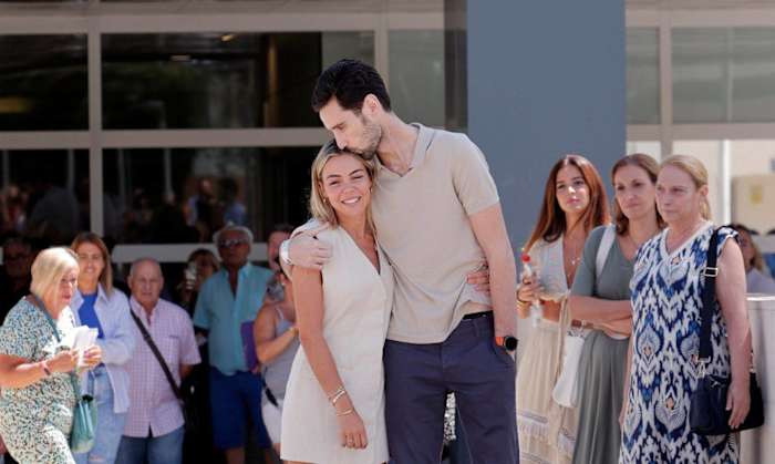 Sergio Rico pictured kissing his wife Alba Silva after the goalkeeper was discharged from hospital in August 2023